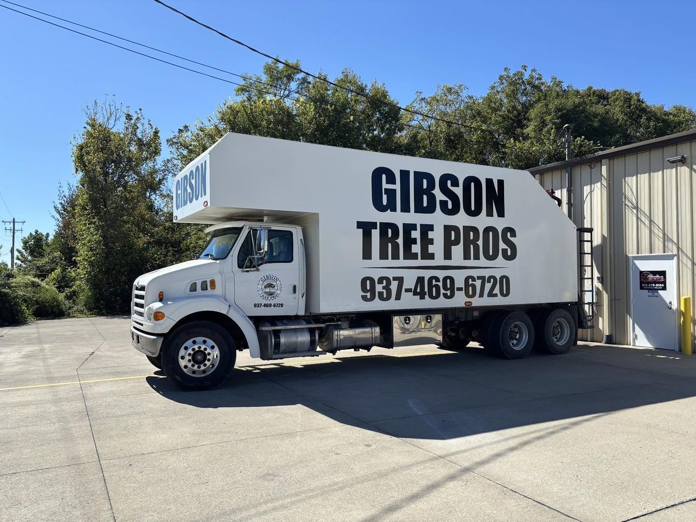 Gibson Tree Pros box truck lettered in navy